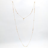Ring around Baroque Pearl - long necklace